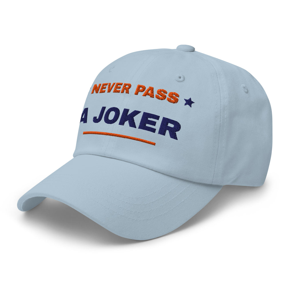 Never Pass a Joker embroidered mahjong dad hat in light blue, three-quarter front view from the left