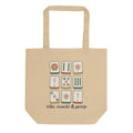 Tiles, Snacks & Gossip mahjong tote bag in natural oyster organic cotton, front, with nine illustrated mahjong tiles